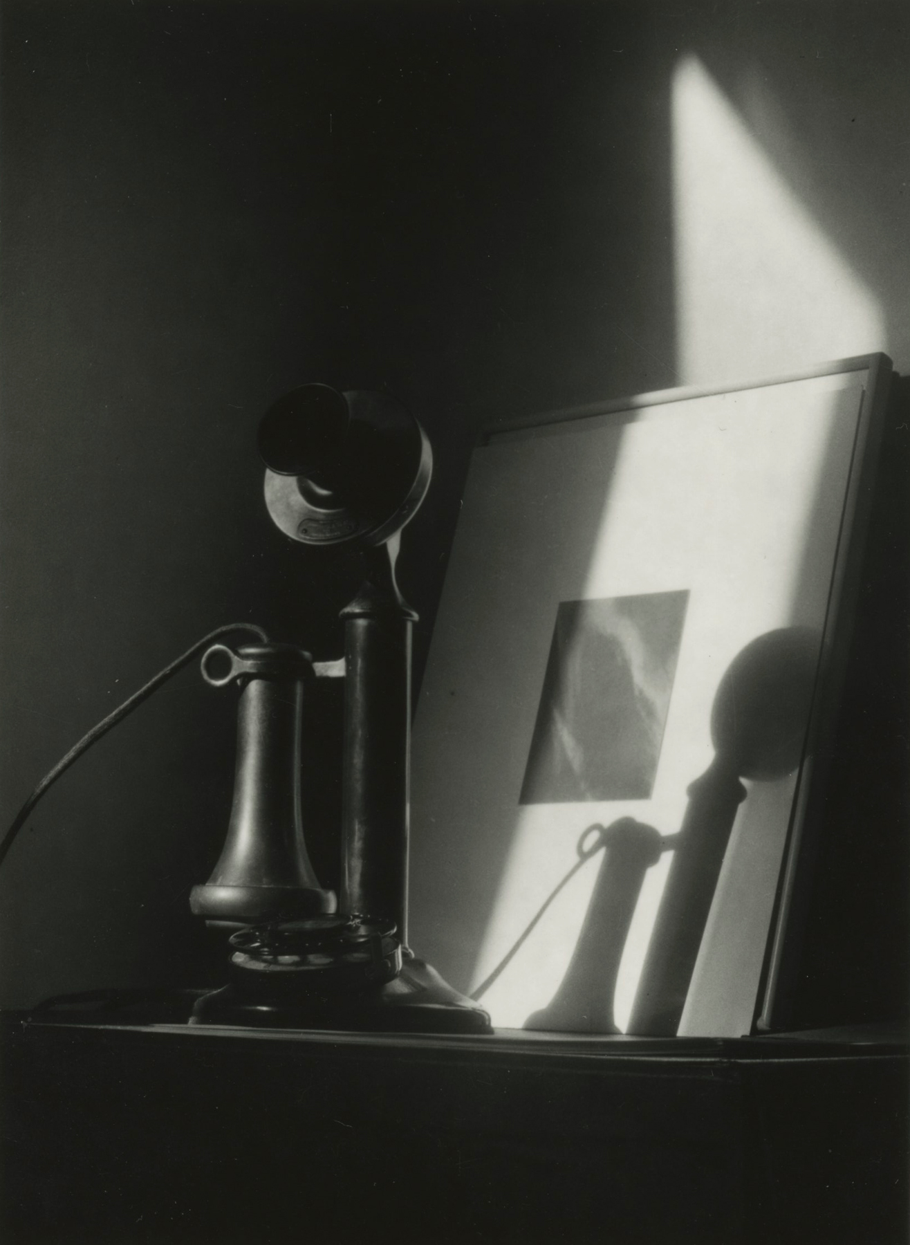 Telephone, in front of Alfred Stieglitz "Equivalent," at An American Place, New York, c. 1940